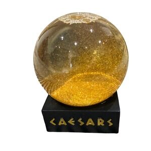 Caesars Glass Glitter Snow Globe Paperweight Gold Casino Souvenir Vegas